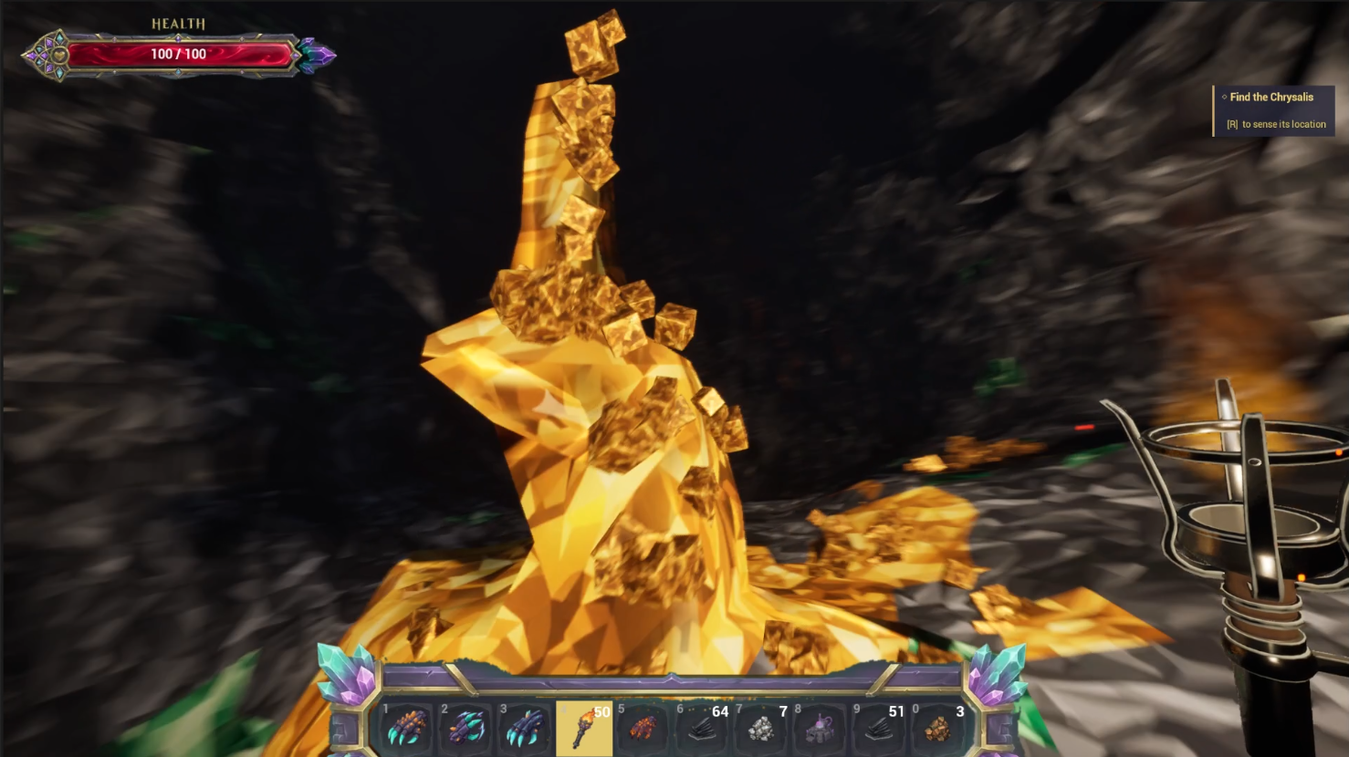 Towering golden crystalline spire rising from a cavern floor