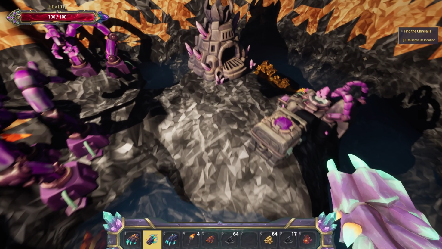 Underground cavern with spider creatures patrolling near ancient rock formations